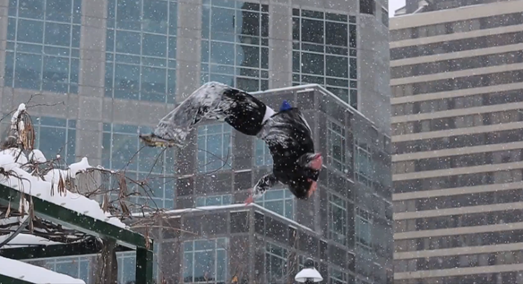 Ice Parkour: Man Runs Around Doing Cool Flips Over Walls In Wintertime 