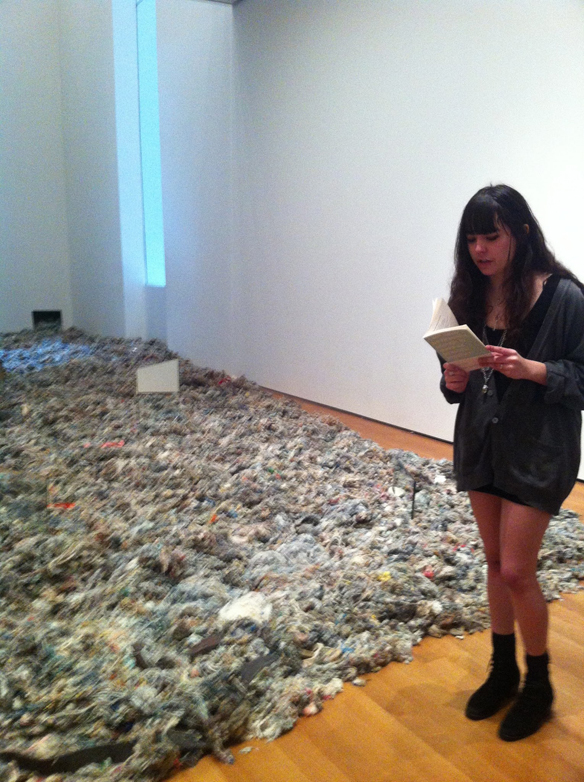 Mira reading at MoMA