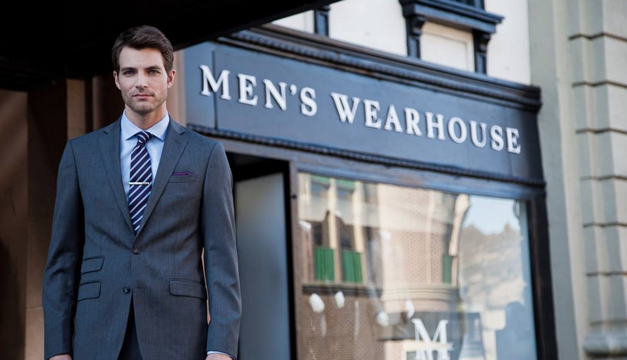 A model standing outside a Men's Wearhouse store Men's Wearhouse Facebook