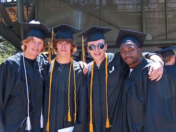 Todd (far left), me (second from left), and our track teammates on graduation day. We had the whole world in front of us.
