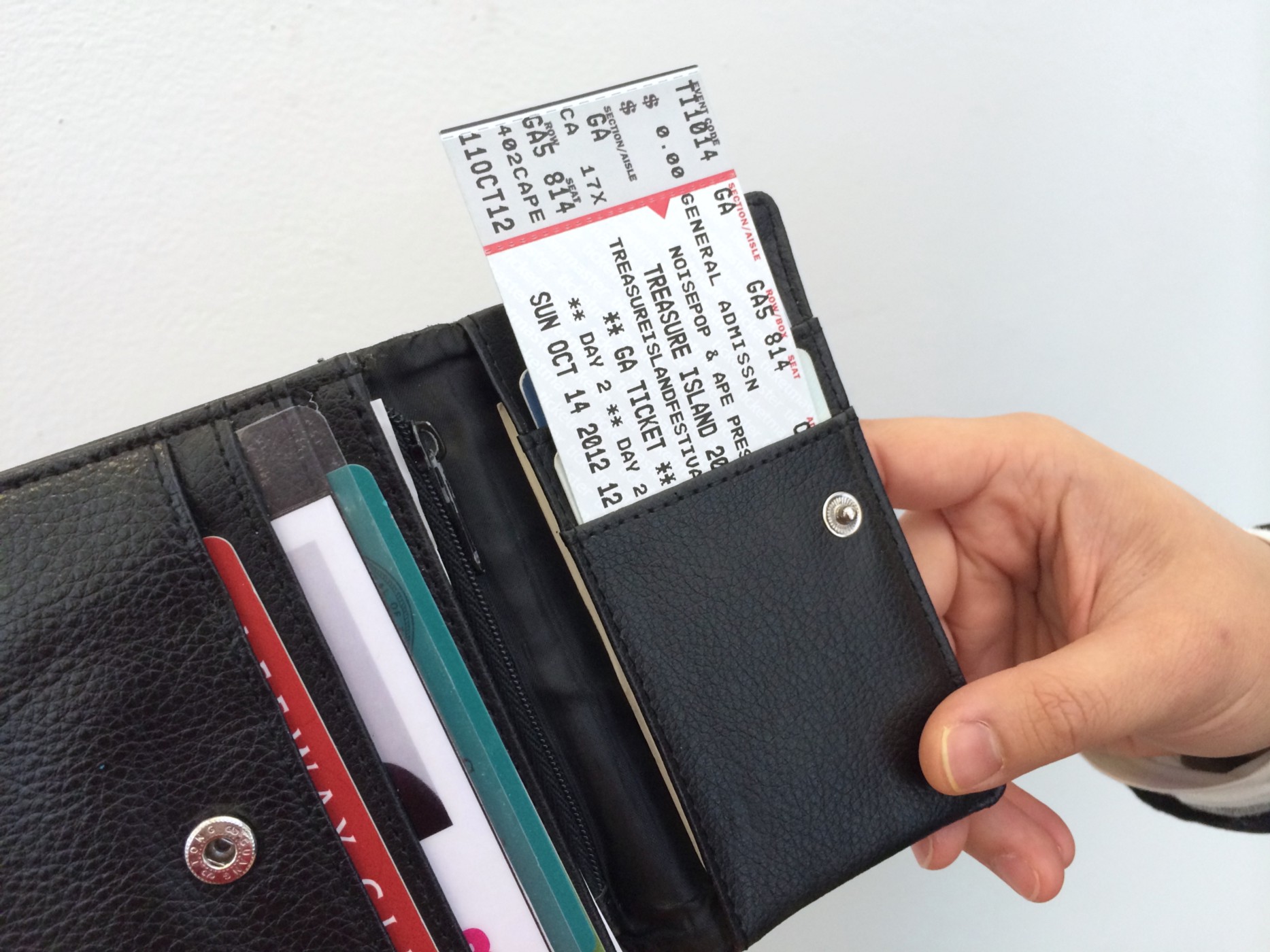The ticket is two inches wide and can fit into a credit card slot. But it’s too long to fit in a wallet.