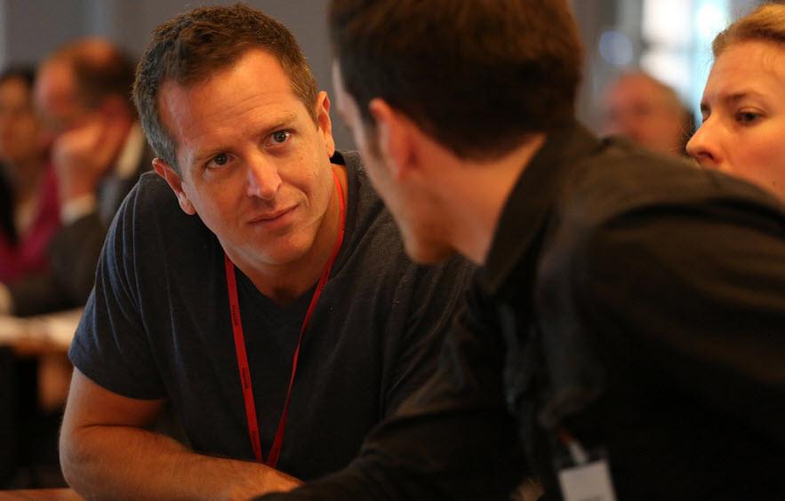 Hugh Howey speaks with a fellow delegate to Klopotek AG's Publishers' Forum in Berlin earlier this month. Photo: Klopotek AG