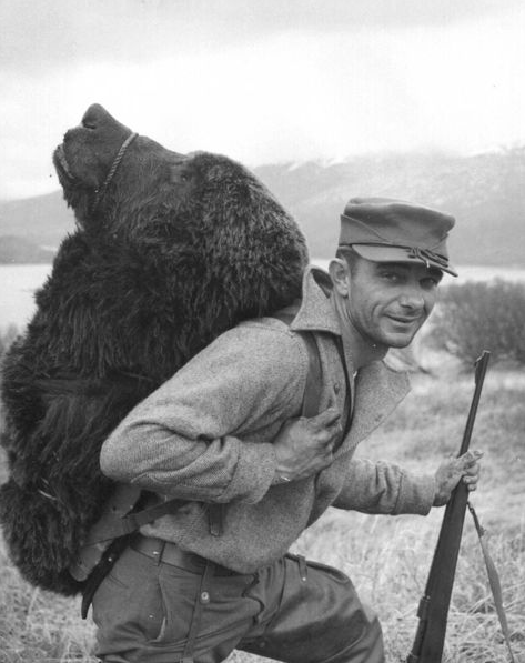 American bear hunter in Alaska, 1957, Wikimedia Commons