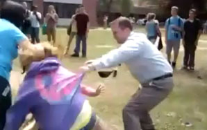 Assistant Principal Tackles Female Student to Stop Schoolyard Cat Fight