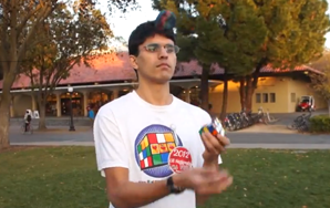 Boy Solves A Rubik’s Cube While Juggling