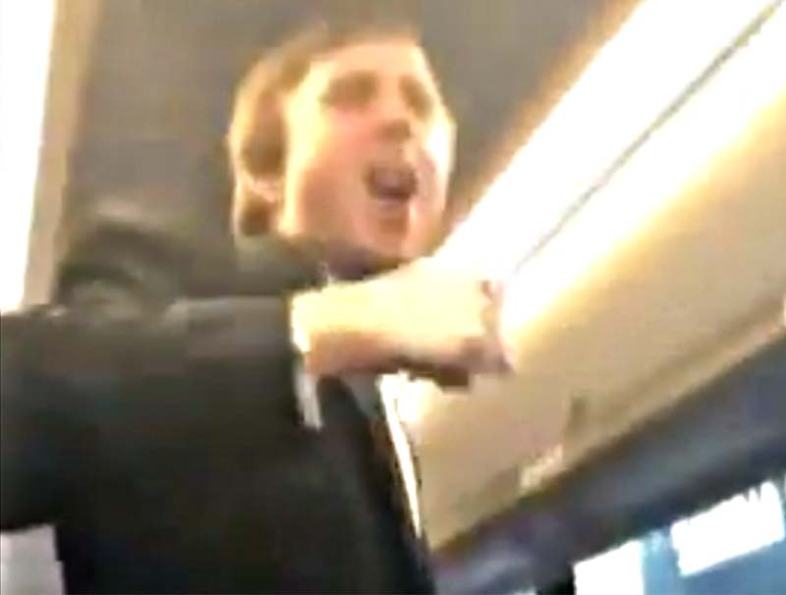 Tuxedo-clad member of Sigma Alpha Epsilon fraternity at University of Oklahoma leads a bus full of partygoers on a racist chant Saturday night. / ((The Unheard Movement via YouTube))