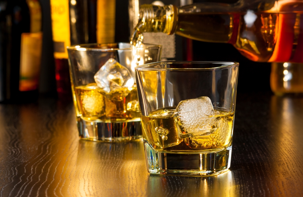 7 Attractive Qualities About Girls Who Drink Whiskey, According To A