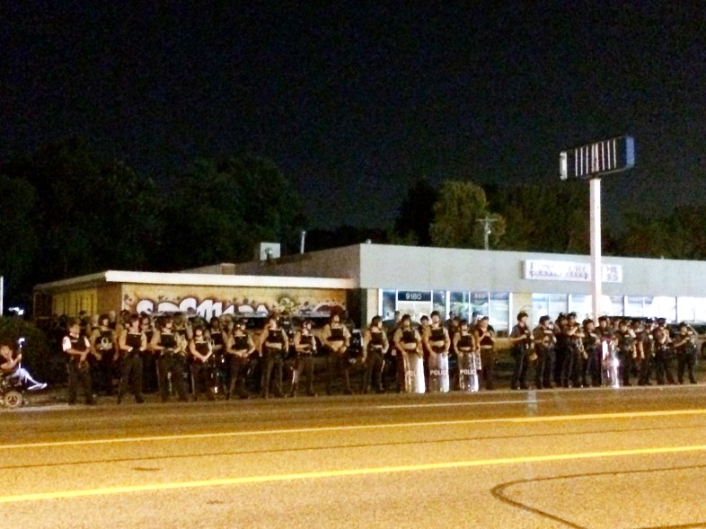Ferguson police in riot gear at protest