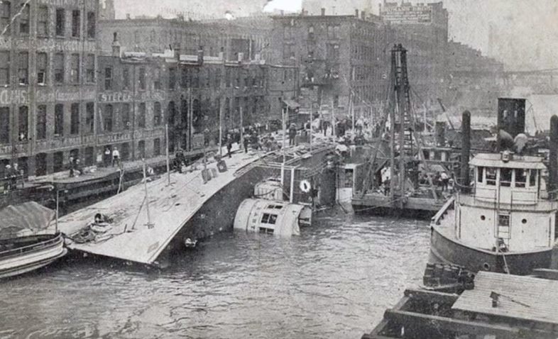 S.S. Eastland tipped over in the Chicago River, July 1915. (YouTube)