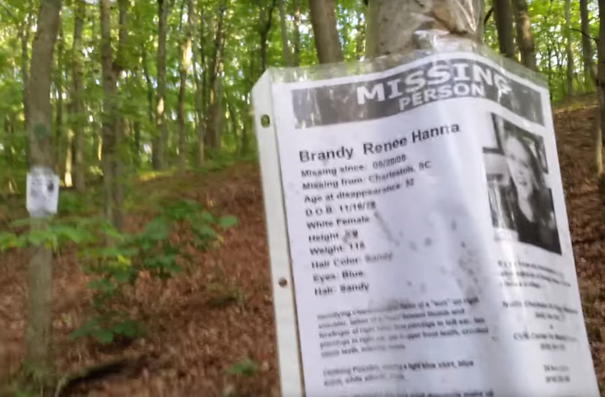 Video: Man Discovers A Bizarre Campsite In The Middle Of The Woods…Surrounded By Pictures Of Missing Persons