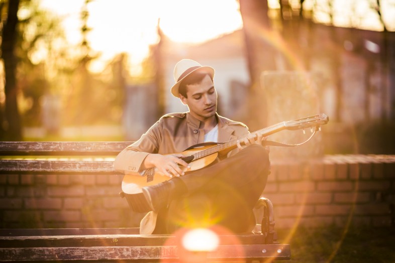 Young man playing guitar