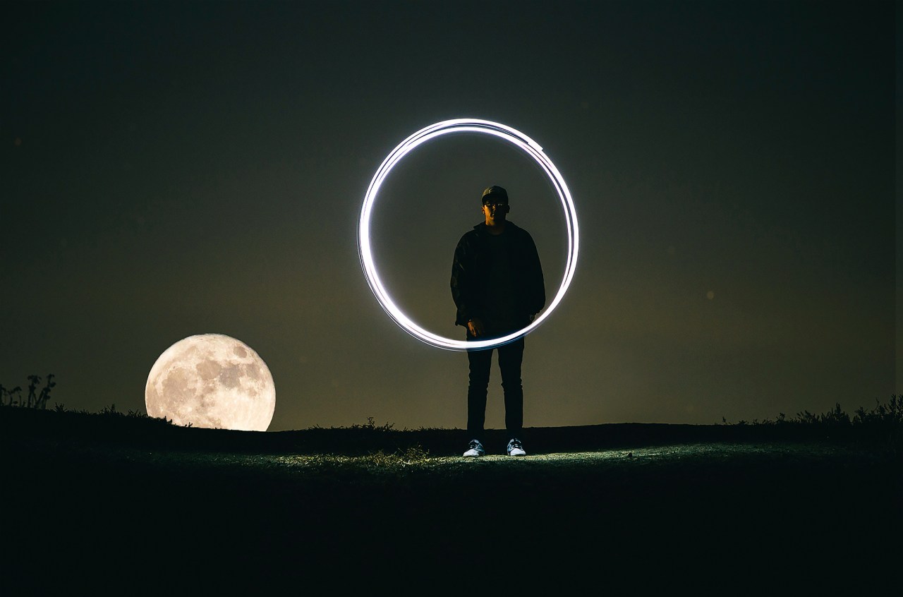 moon sign, man next to moon