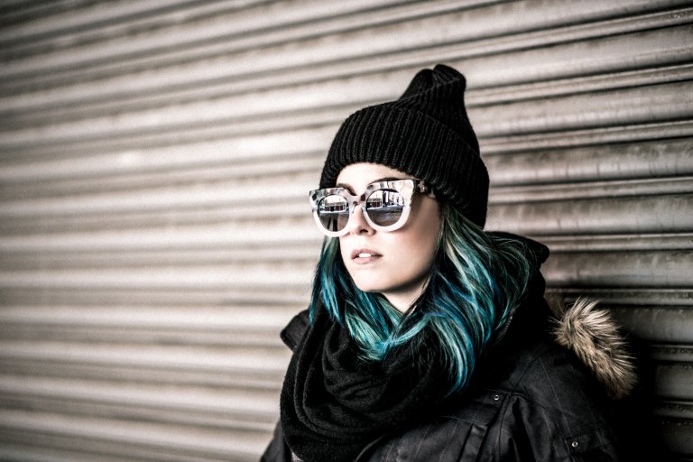 Girl with sunglasses and blue hair