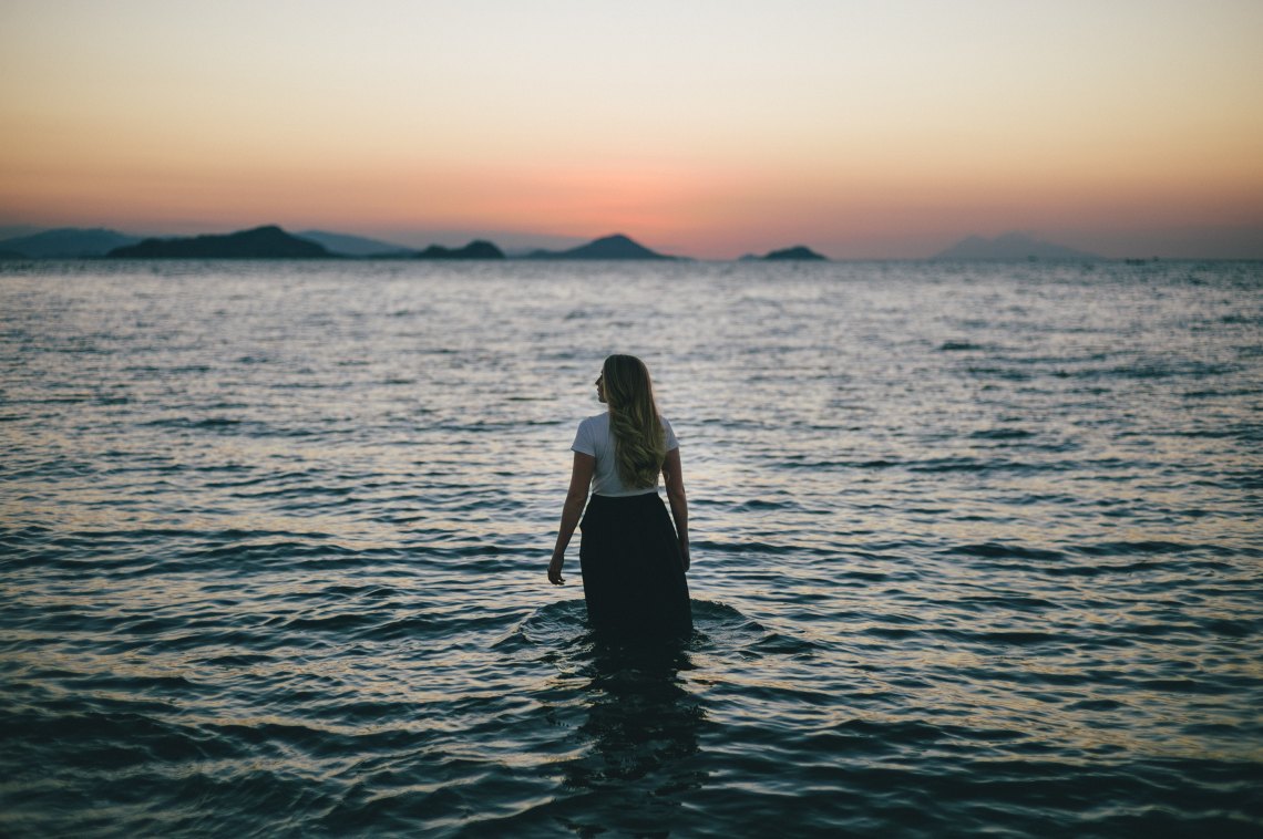 girl in ocean looking out