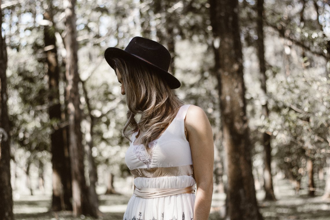 girl in forest looking away
