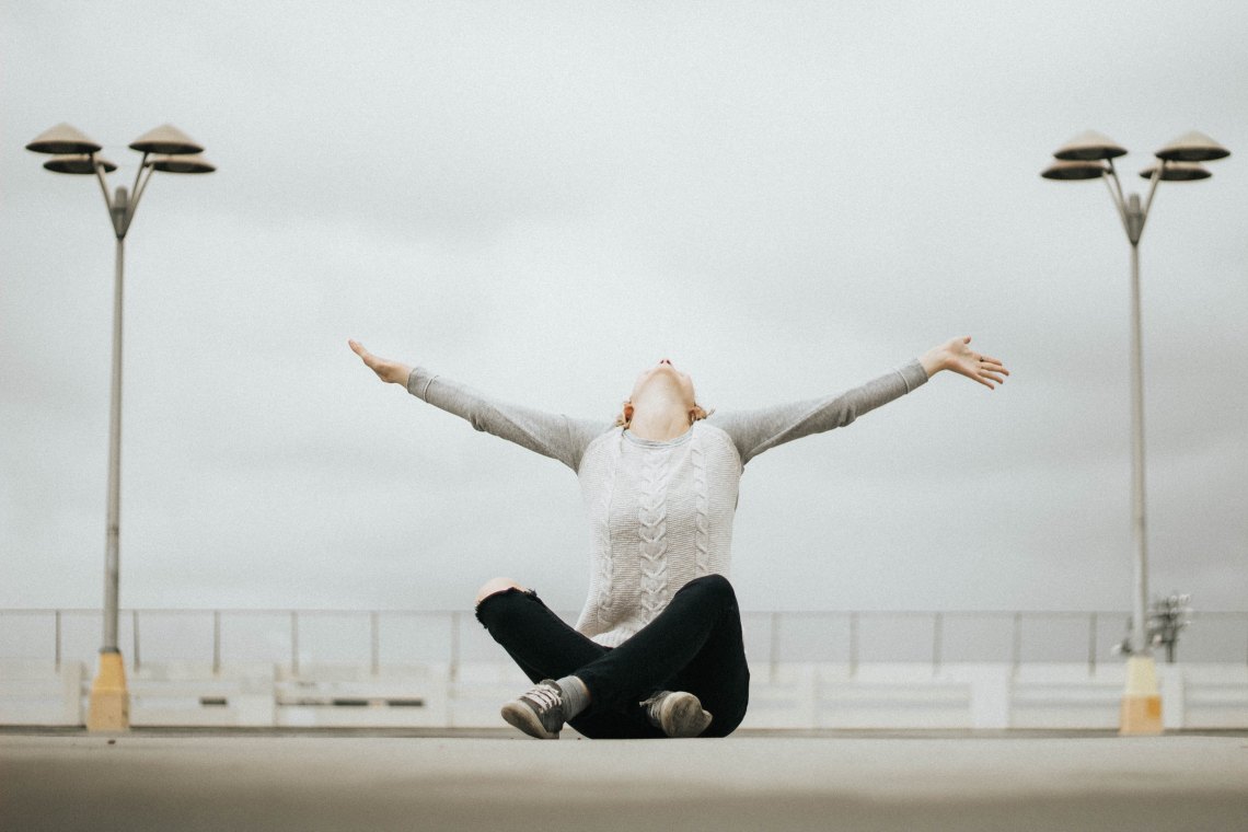 woman with outstretched arms