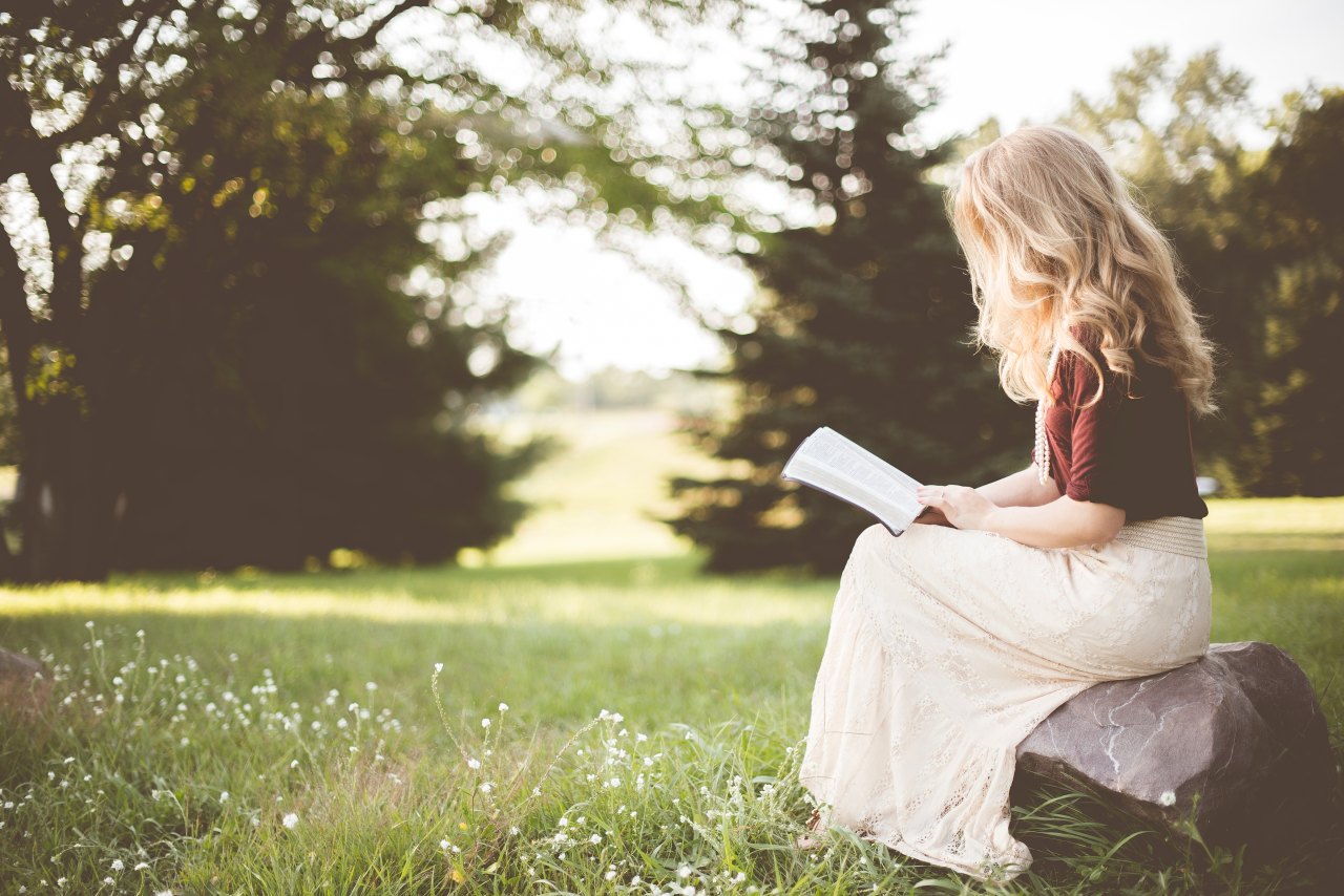 Woman reading in park