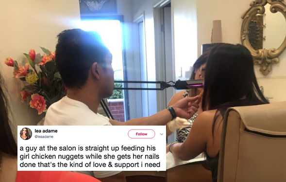 Boyfriend feeds girlfriend chicken nuggets at the salon while she's getting her nails done