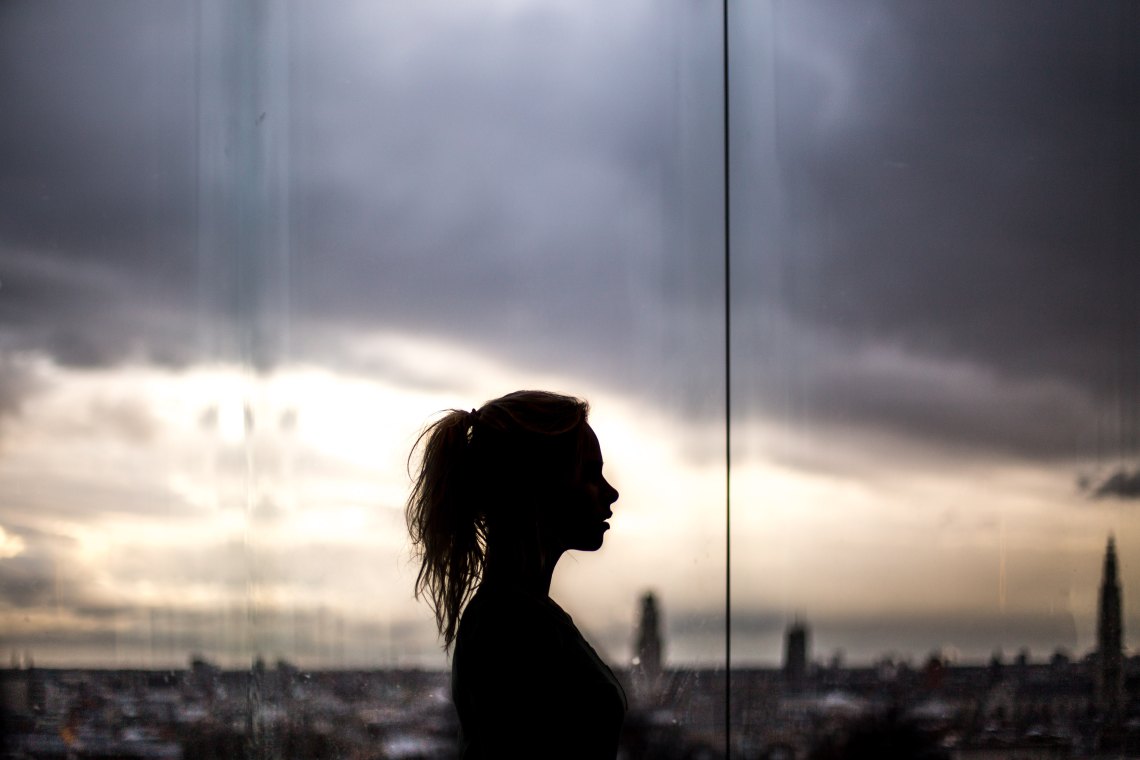 Woman's silhouette in front of sky