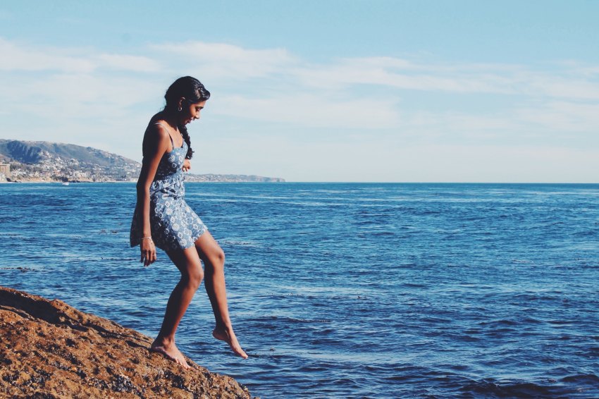 woman playing on shore