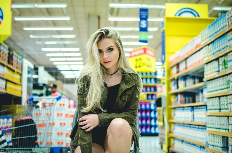 blonde woman in drugstore