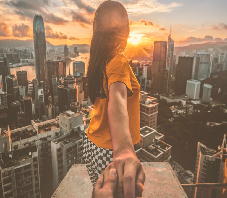 couple holding hands, i'll love you better, girl looking at city, couple
