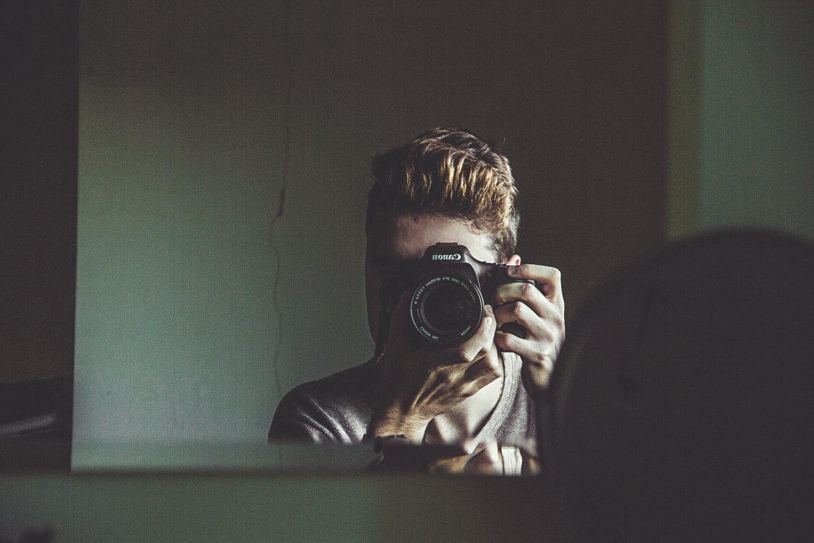 man taking mirror picture