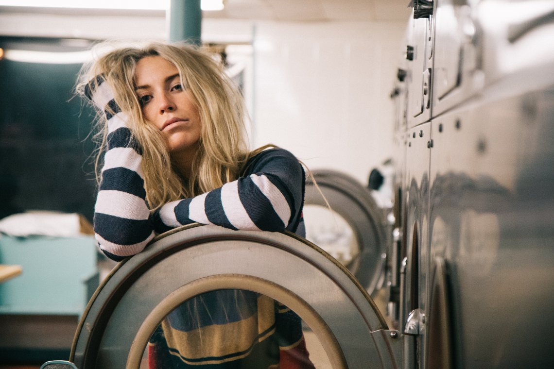 woman in laundromat