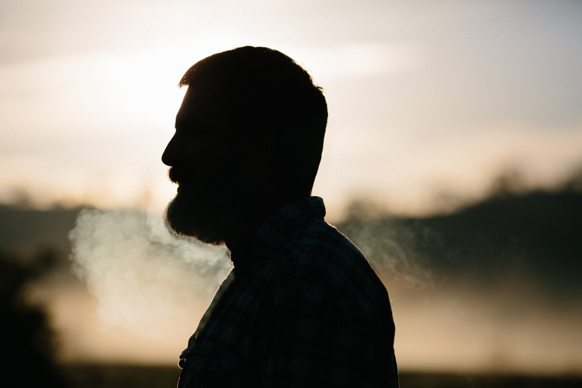The silhouette of a man in the cold winter air