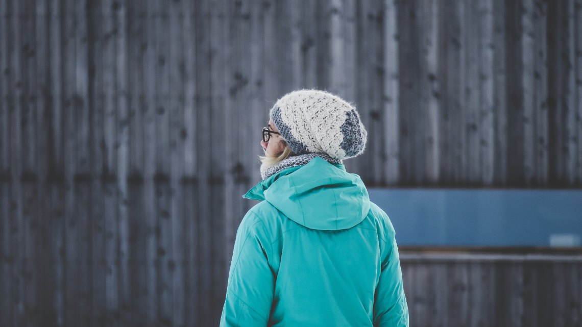 Woman in blue coat