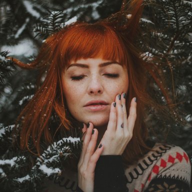 girl in evergreen trees, letting him go, letting go