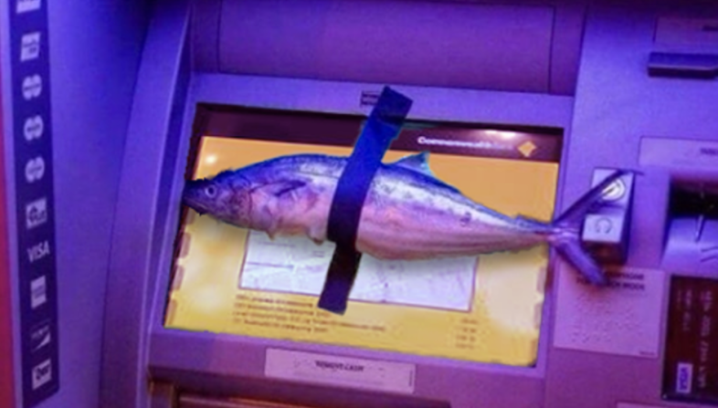 A fish taped to an ATM in protest
