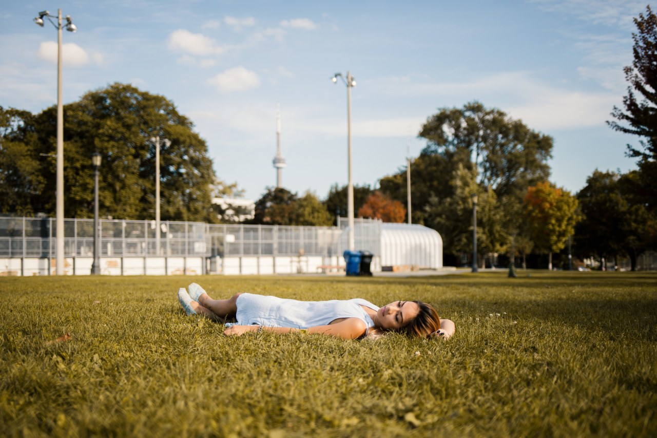 girl laying in grass field, anxious heart, prayers, prayers for the anxious heart