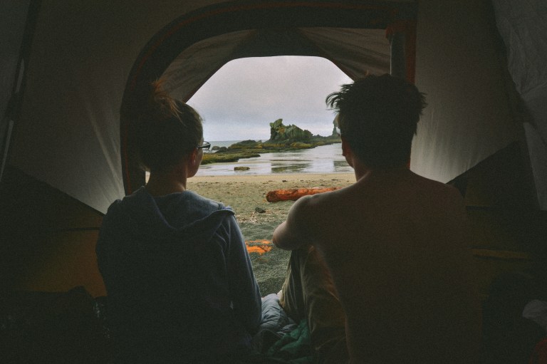 couple looking outside tent, couple in tent, narcissistic relationship, narcissistic partner, narcissistic signs to look out for
