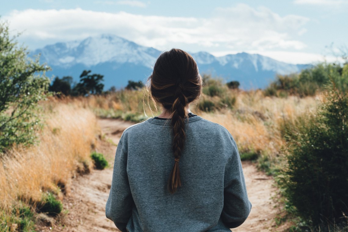Girl standing in desert