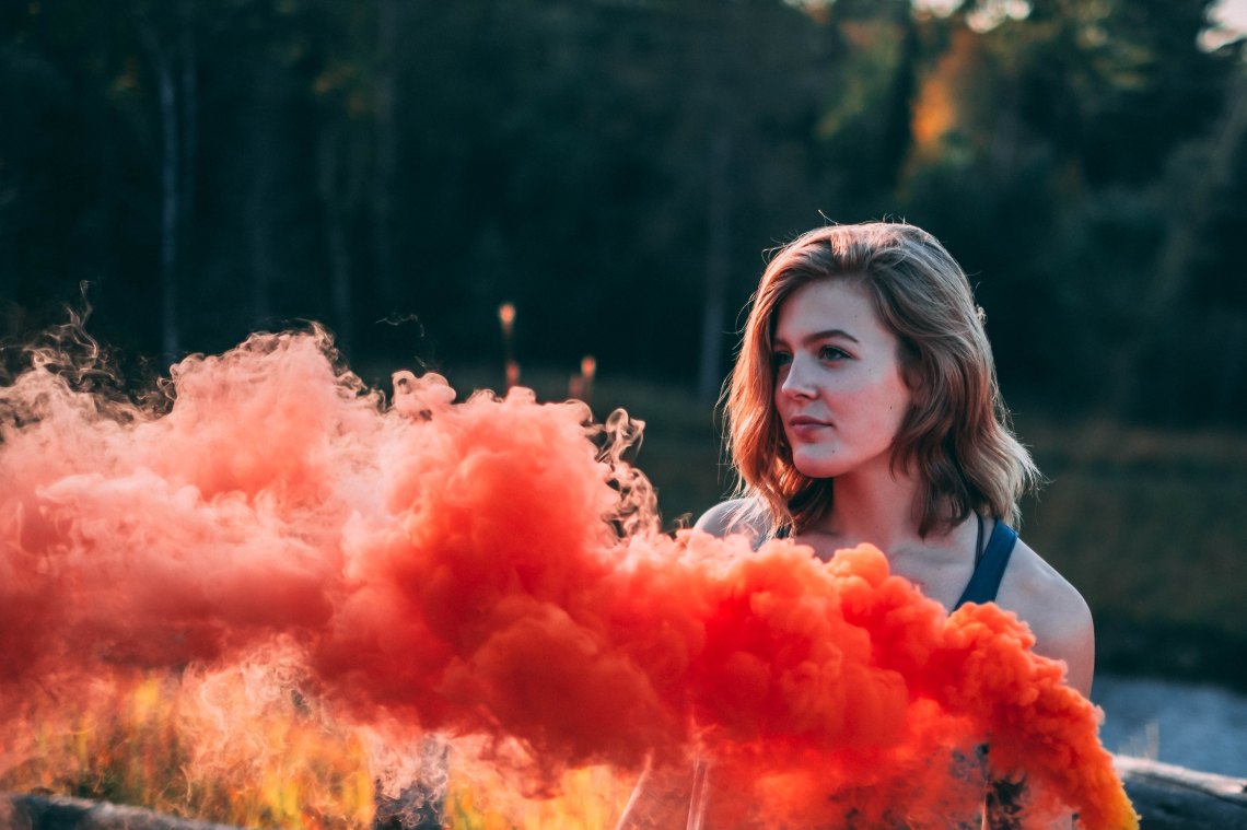 girl with red smoke