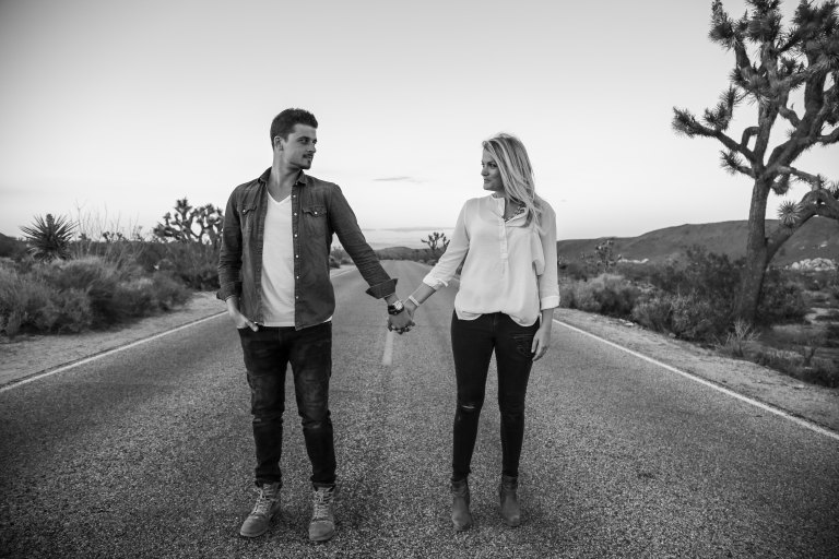 happy couple holding hands in the street, happy couple, holding hands, forever love