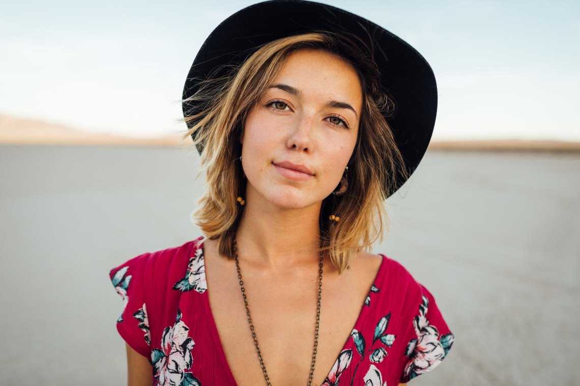 woman standing in desert