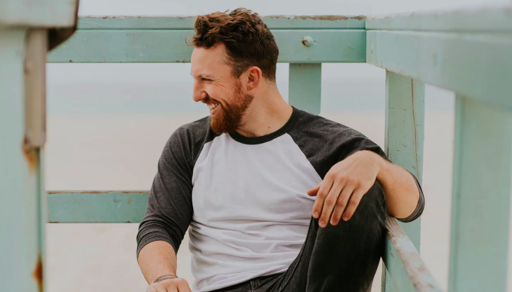 Guy laughing on dock