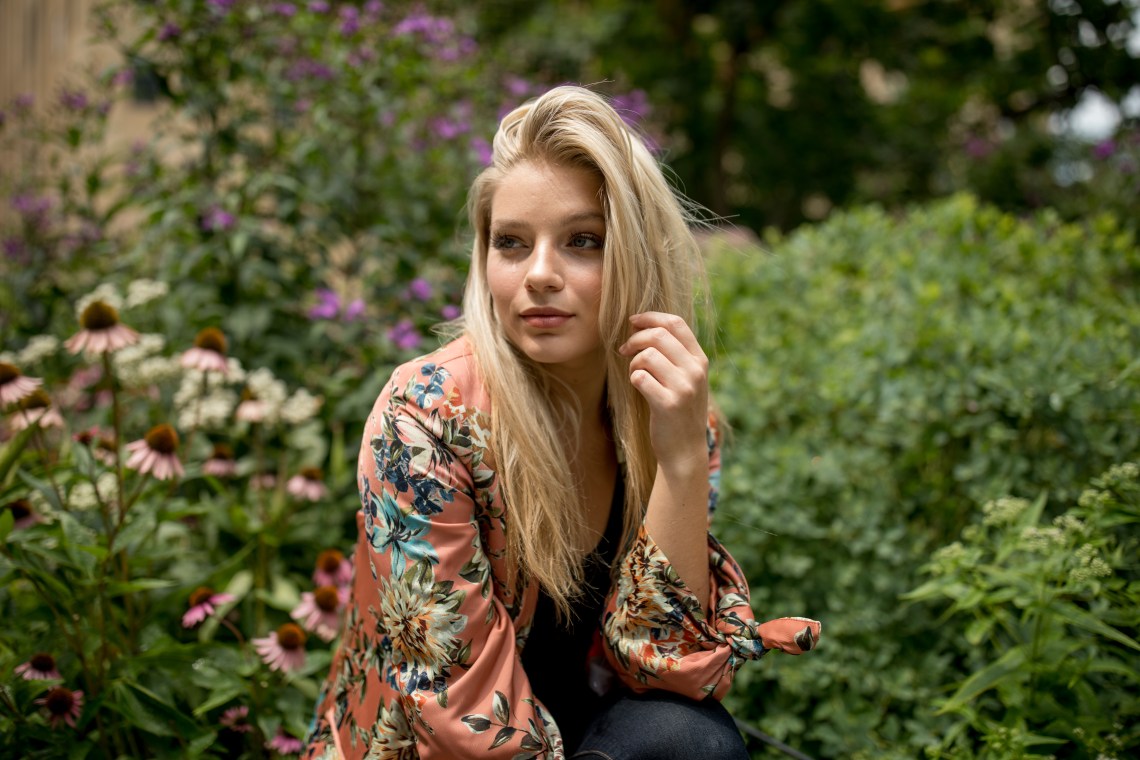 woman sitting in garden