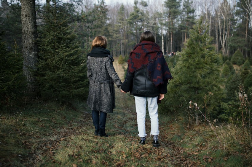 Two Best Friends Taking In The Peaceful Atmosphere while holding hands