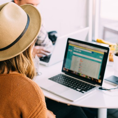 girl sitting at her computer at work
