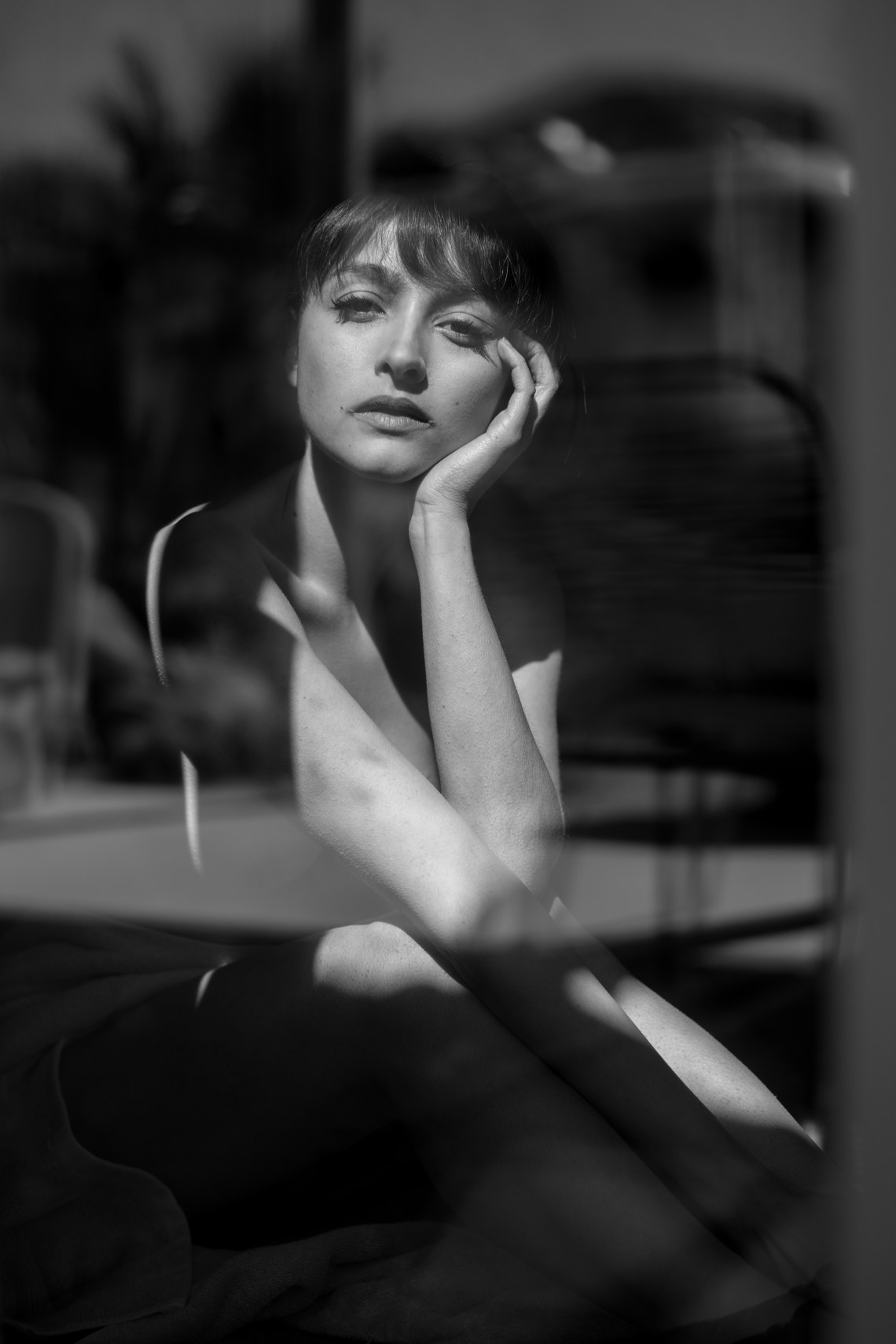 woman sitting looking sad