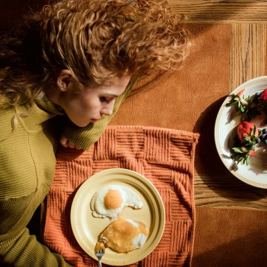 Unhappy lonely girl resting on table