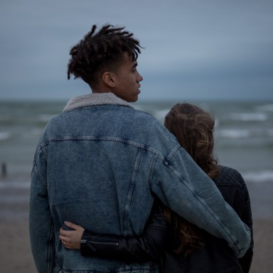 couple standing on beach