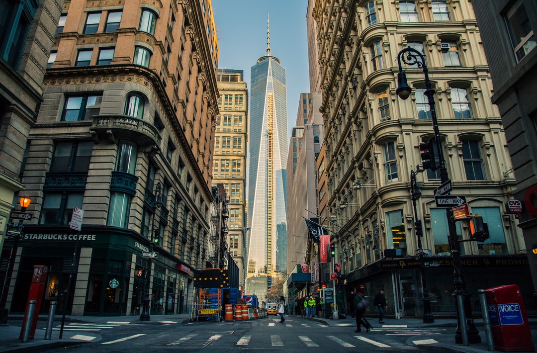 View of Freedom Tower in New York City in between buildings