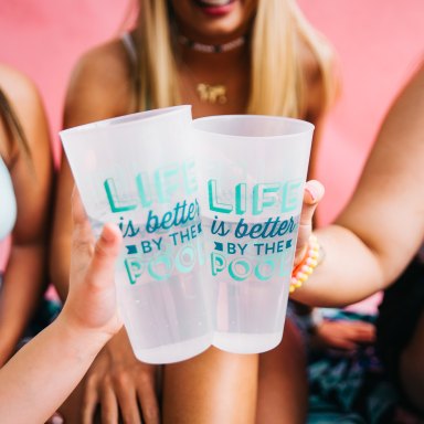 friends cheersing with plastic cups