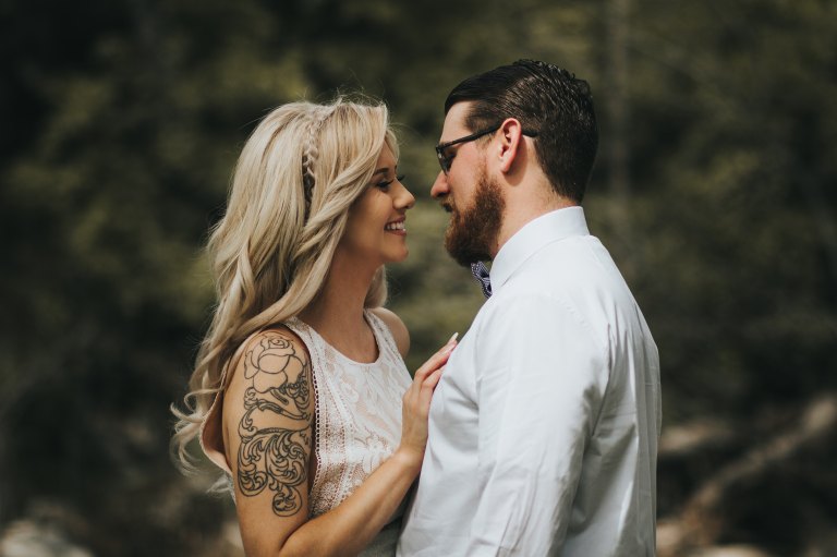 couple with tattoos and a cool vibe loving each other
