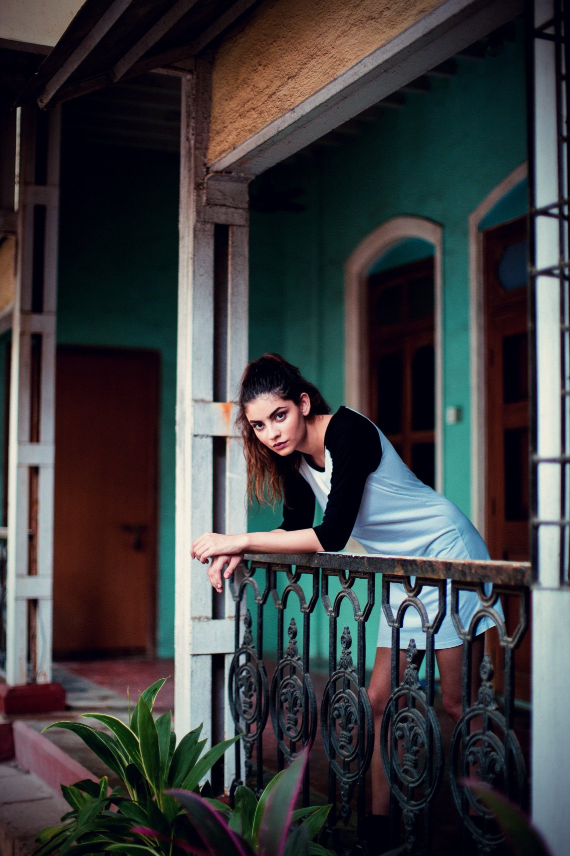 woman standing on balcony