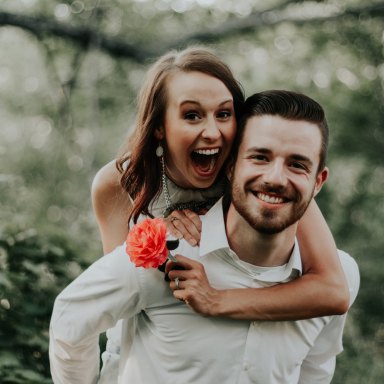 Couple laughing and hugging
